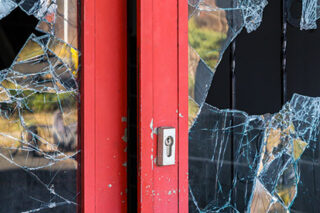 photo - Broken Window at Business
