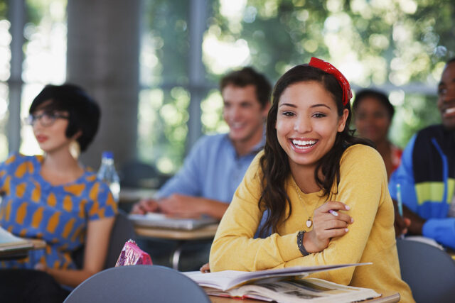 photo - College Students Smiling in Classroom