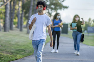 photo - College Students Wearing Masks and Walking on Campus