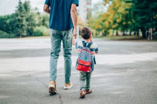 photo - Father and Son Holding Hands Walking