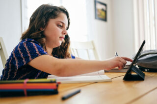 photo - Girl Distance Learning with Tablet