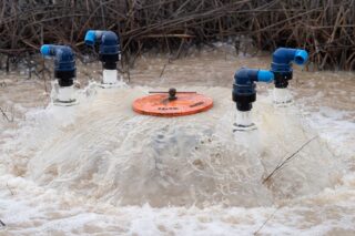 photo-Groundwater Recharge FloodMar Site, Pumped Water Discharged into Agricultural Field, pixel ca dwr 2023_01_18_AI_0006_Groundwater_Recharge