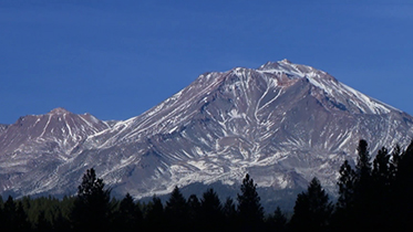 Photo of mountain with minimal snow