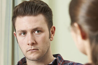 photo - Man Listening during Counseling with Woman