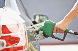 photo - Man Pumping Gas