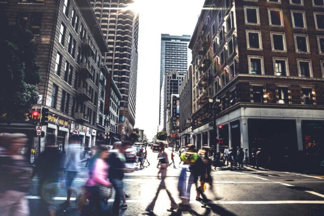 photo - People Crossing Street in Downtown San Francisco