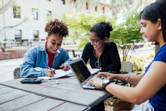 photo - Students Studying Outside Together