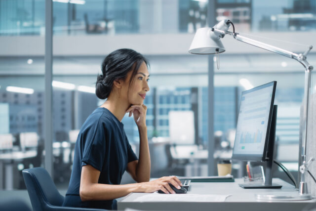 photo - Tech Employee Working at Computer