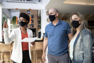 photo - Three Adults Wearing Masks