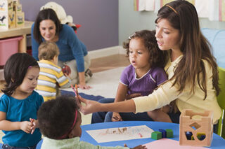photo - Teachers and Toddlers in Daycare
