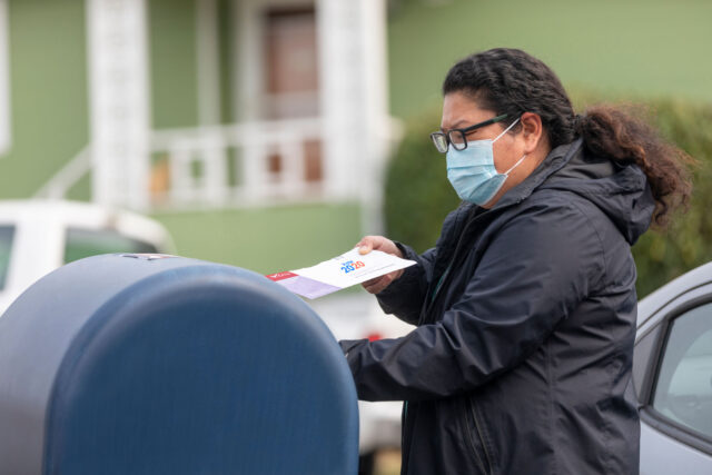 photo - Woman Mailing 2020 Ballot