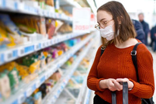 photo - Young Woman Wearing Mask and Grocery Shopping